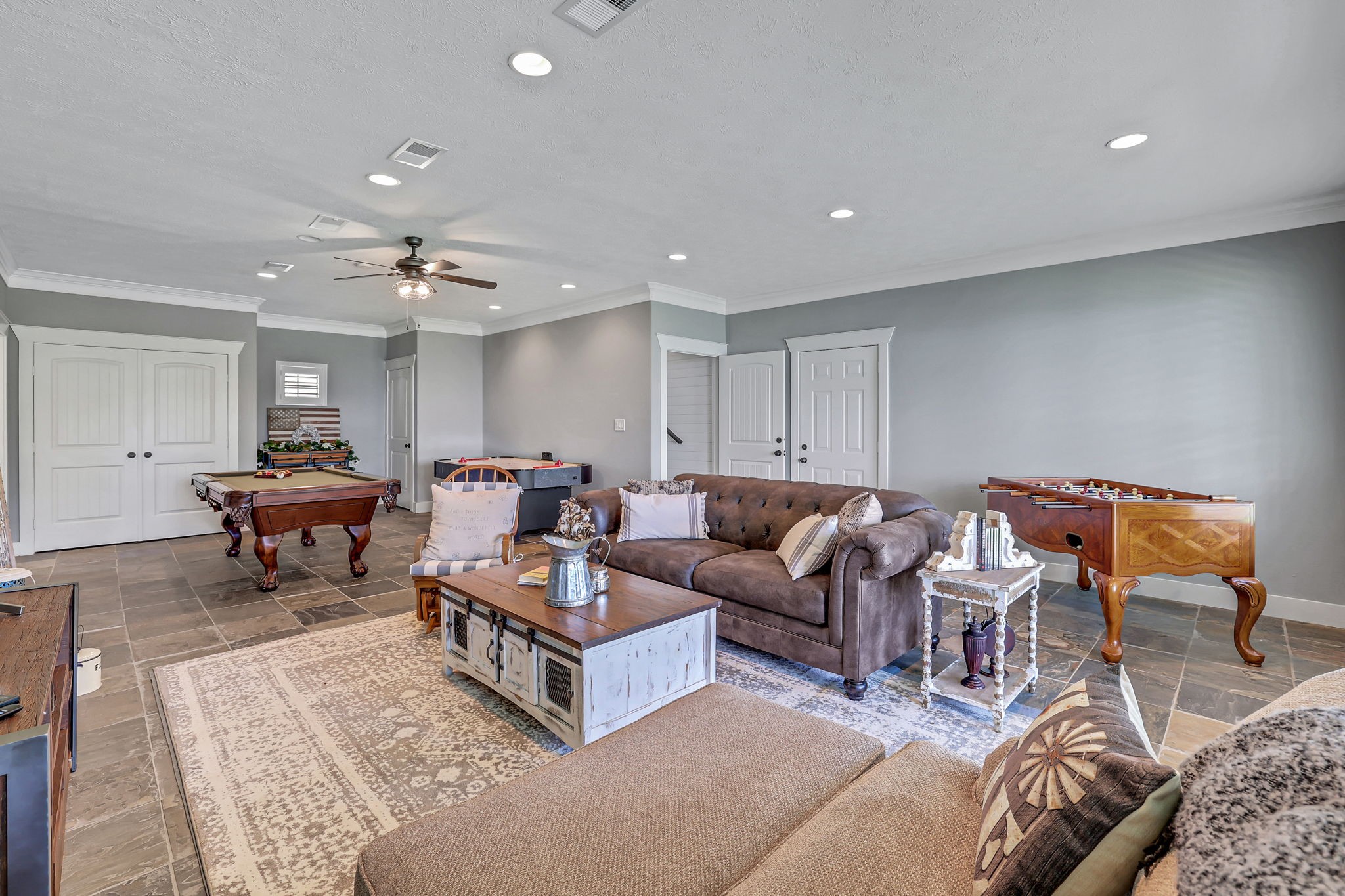 231 Ridge Cove Lane Coldspring, TX 77331 - Photo 34 of 50 Spacious game room is ready for family movie nights, game days and making lasting memories together