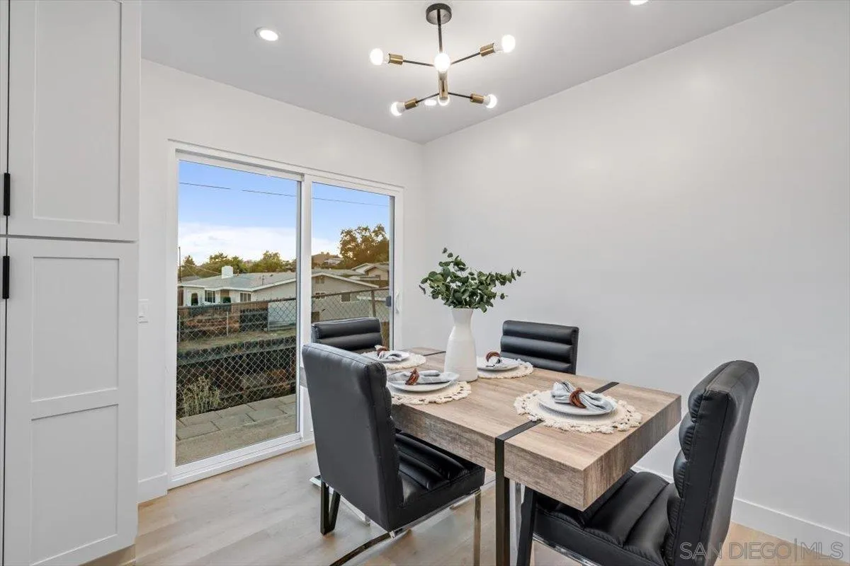 13259 Saddle Ridge Road Lakeside, CA 92040 - Photo 21 of 57 a view of a dining room with furniture window and wooden floor