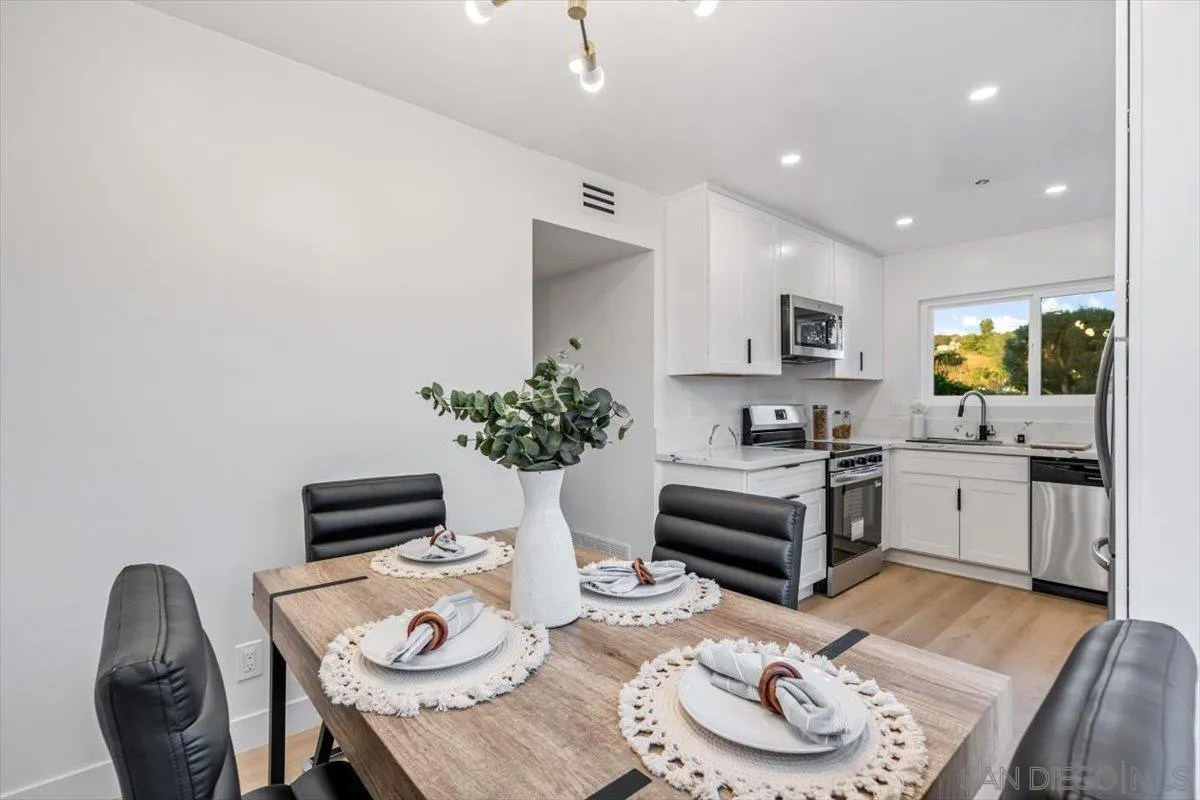13259 Saddle Ridge Road Lakeside, CA 92040 - Photo 22 of 57 a living room with furniture and a wooden floor
