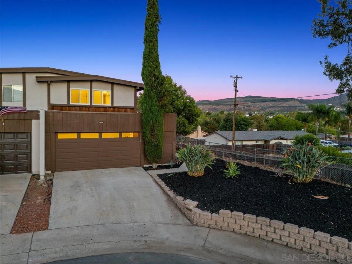 13259 Saddle Ridge Road Lakeside, CA 92040 - Photo 3 of 57 a front view of a house with a garden