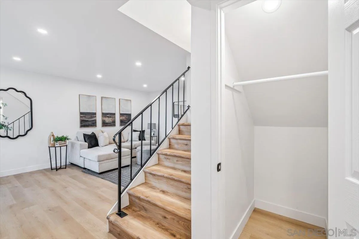 13259 Saddle Ridge Road Lakeside, CA 92040 - Photo 31 of 57 a view of entryway with stairs and wooden floor
