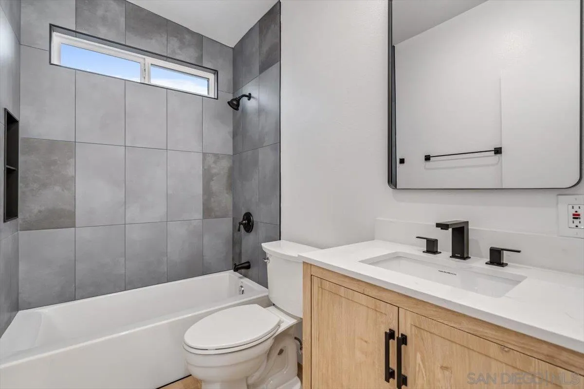 13259 Saddle Ridge Road Lakeside, CA 92040 - Photo 39 of 57 a bathroom with a sink a toilet and shower