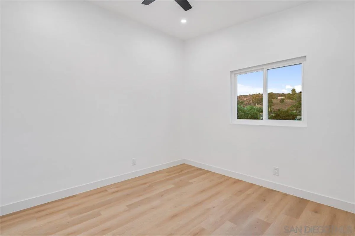 13259 Saddle Ridge Road Lakeside, CA 92040 - Photo 40 of 57 an empty room with a window