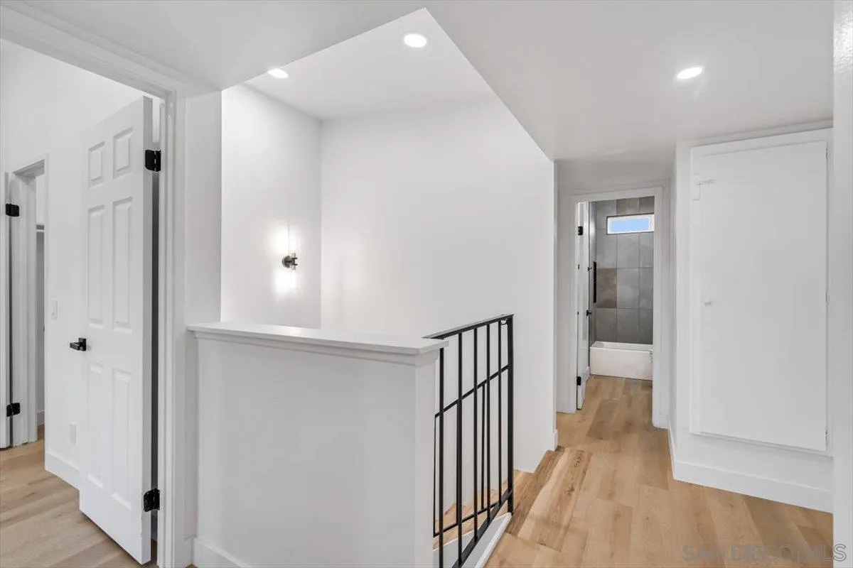 13259 Saddle Ridge Road Lakeside, CA 92040 - Photo 42 of 57 a view of a hallway with a wooden floor