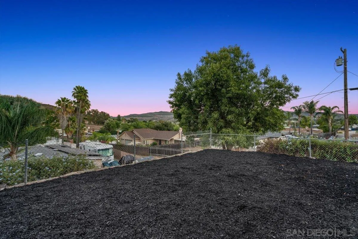13259 Saddle Ridge Road Lakeside, CA 92040 - Photo 48 of 57 a view of a yard with a tree