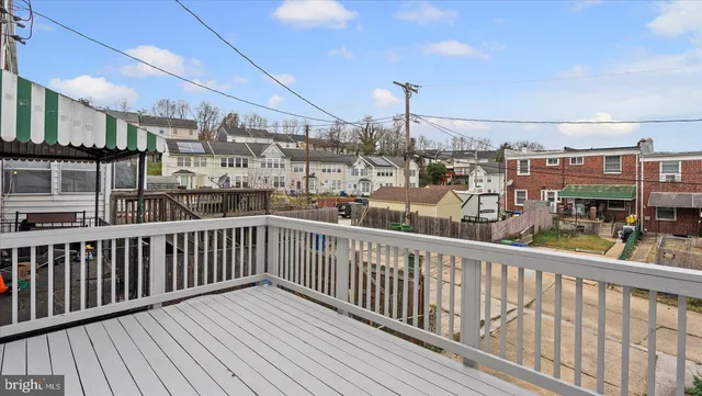 a view of a balcony with city view