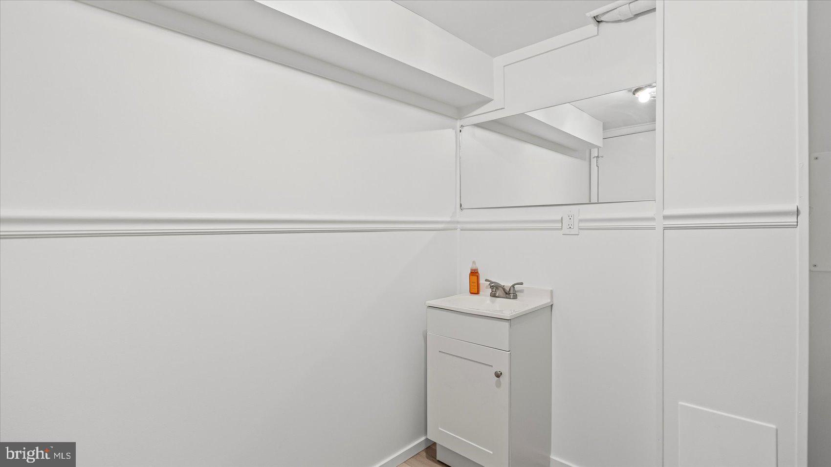 1408 Locust Street Curtis Bay, MD 21226 - Photo 23 of 35 a close up view of washer and dryer