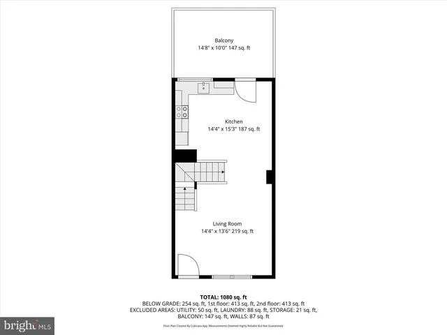 a picture of a bench in front of a building