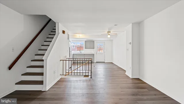 a view of entryway with wooden floor