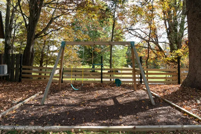 a view of a park with large trees
