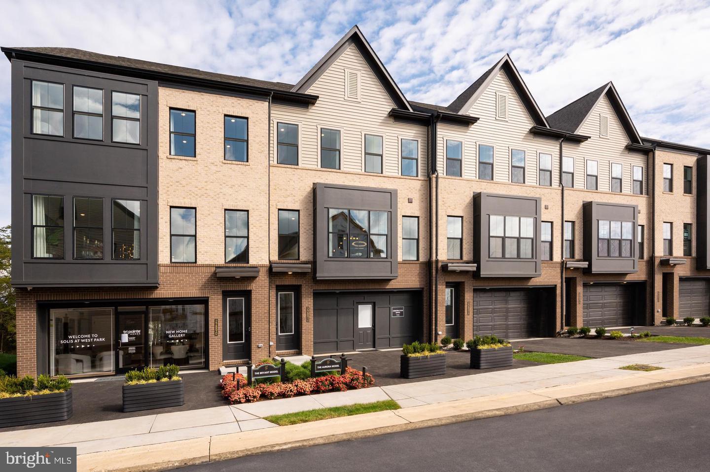22892 Copper Tree Terrace Ashburn, VA 20148 - Photo 1 of 1 Modern townhomes with stylish facades.