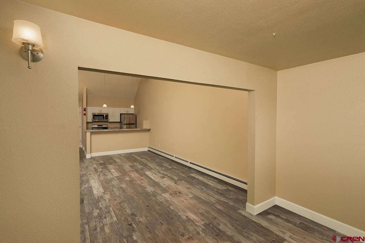 1135 Florida Road, Unit C23 Durango, CO 81301 - Photo 11 of 18 a view of empty room with wooden floor