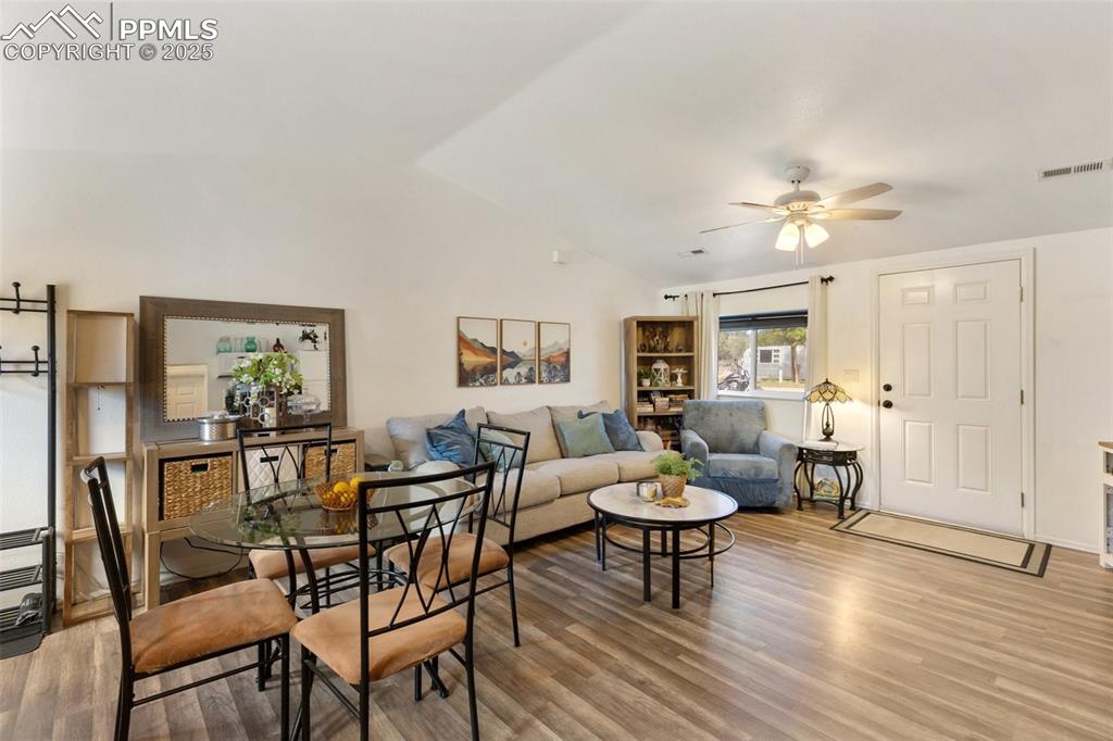 303 East 7th Street Florence, CO 81226 - Photo 12 of 39 a living room with furniture and wooden floor