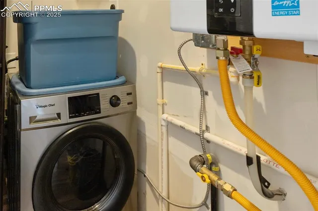 a utility room with dryer and washer