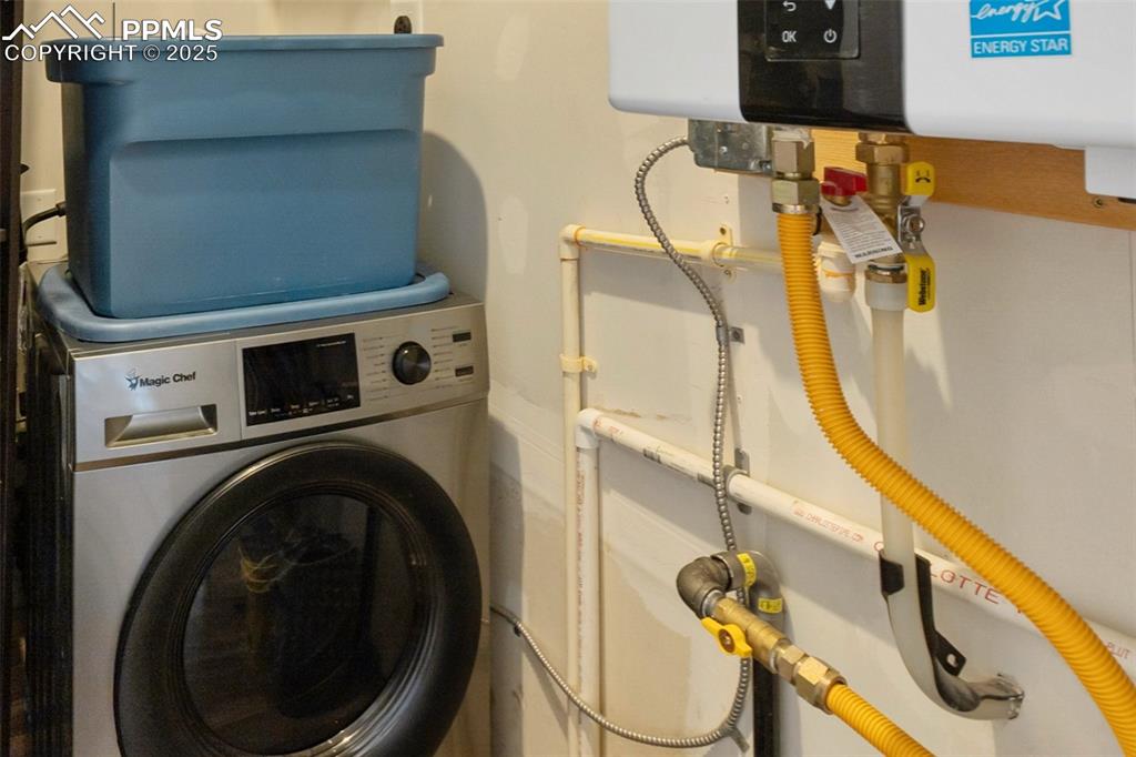 303 East 7th Street Florence, CO 81226 - Photo 18 of 39 a utility room with dryer and washer