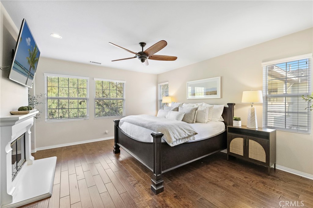 16 Wyndham Street Ladera Ranch, CA 92694 - Photo 24 of 58 a spacious bedroom with a large bed and a large window