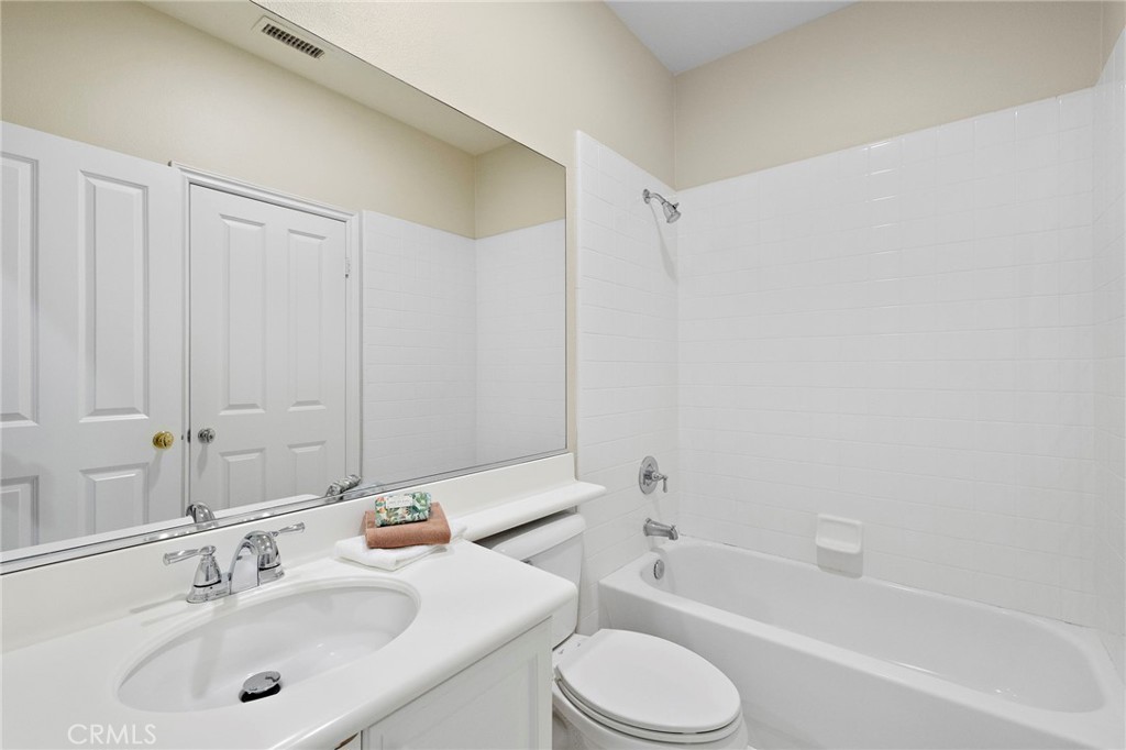 16 Wyndham Street Ladera Ranch, CA 92694 - Photo 30 of 58 a bathroom with a sink toilet and shower