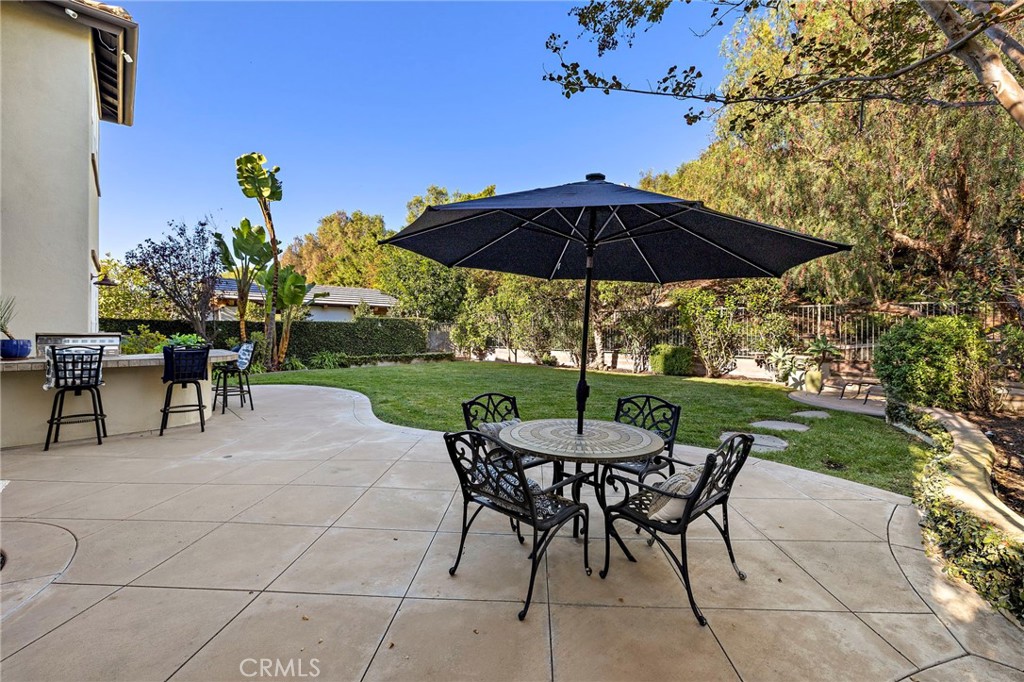 16 Wyndham Street Ladera Ranch, CA 92694 - Photo 37 of 58 a view of a backyard with sitting area furniture and a garden
