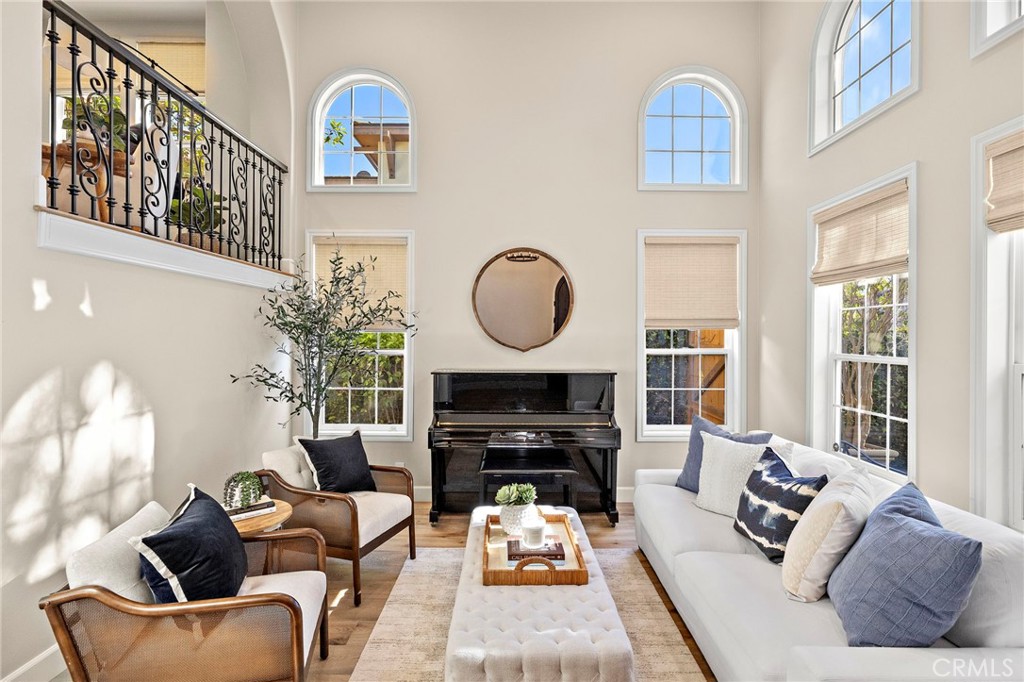 16 Wyndham Street Ladera Ranch, CA 92694 - Photo 4 of 58 a living room with furniture flowerpot and a window