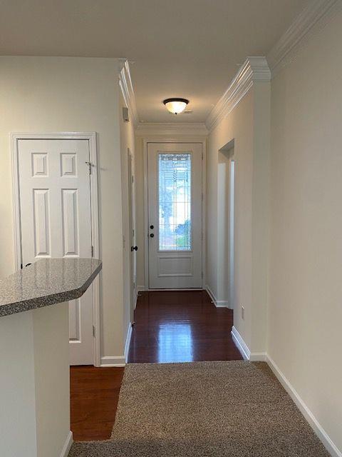 534 Rendezvous Road Acworth, GA 30102 - Photo 5 of 40 an entryway with wooden floor and cabinet