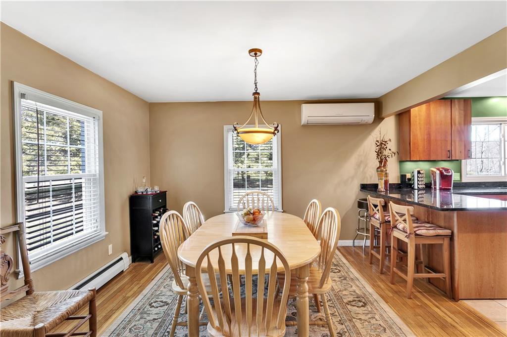 95 Mary Reed Road Baden, PA 15005 - Photo 5 of 25 a view of a a dining room with furniture window and wooden floor
