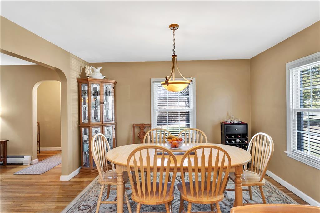 95 Mary Reed Road Baden, PA 15005 - Photo 6 of 25 a view of a dining room with furniture window and wooden floor