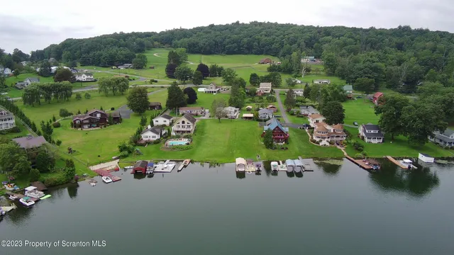 an aerial view of a house with a garden