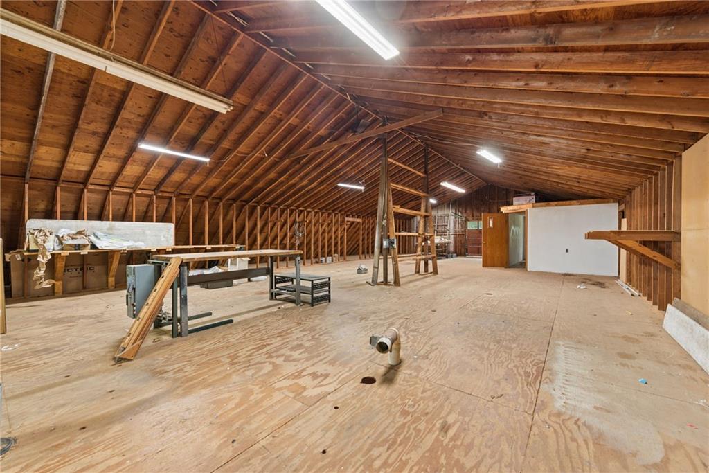 22 Buzzardtown Road Irwin, PA 15642 - Photo 35 of 44 a view of a empty room with wooden ceiling