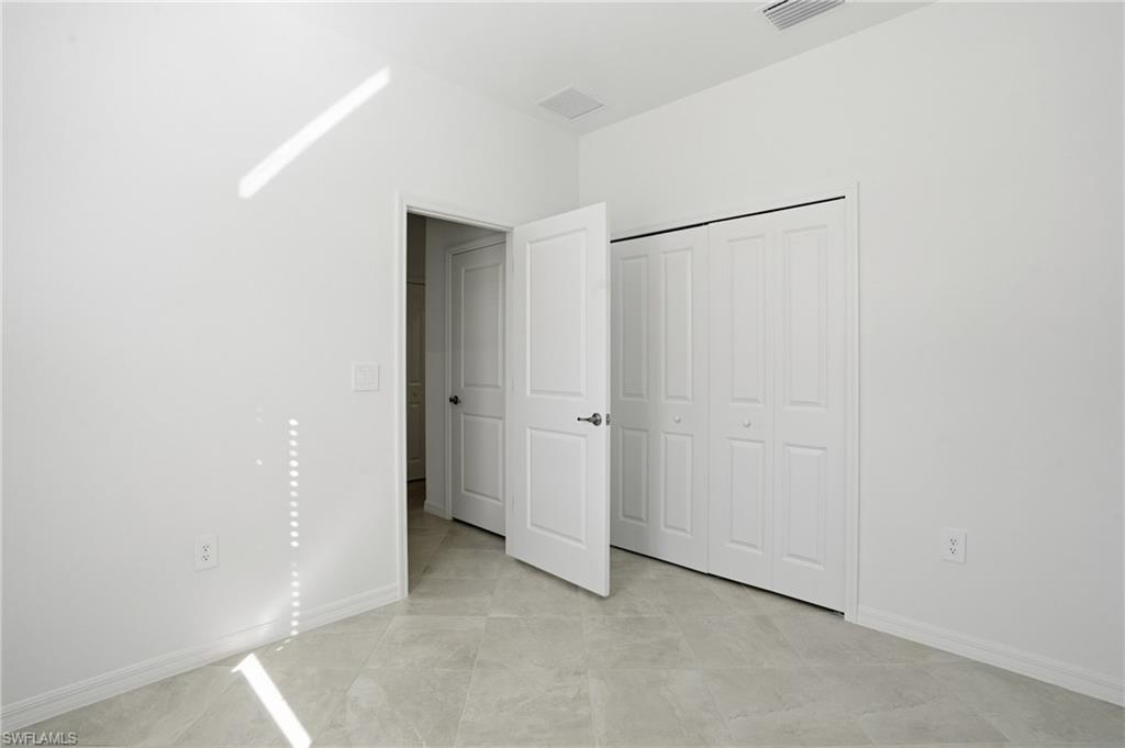 3958 Button Sage Road Alva, FL 33920 - Photo 13 of 50 a view of an empty room