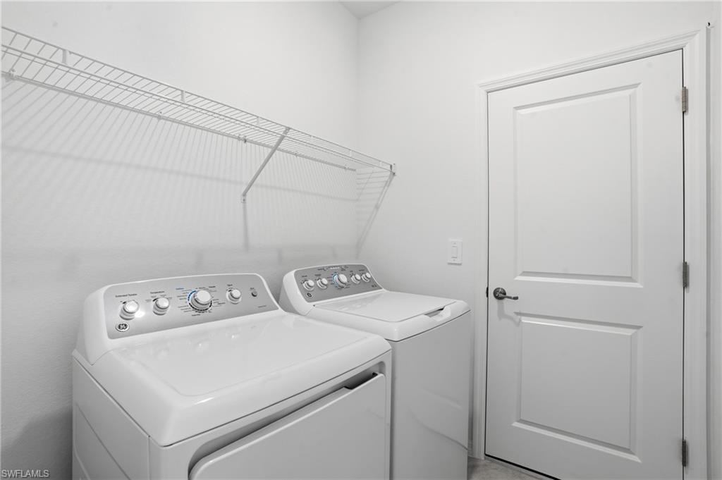 3958 Button Sage Road Alva, FL 33920 - Photo 27 of 50 a utility room with dryer and washer