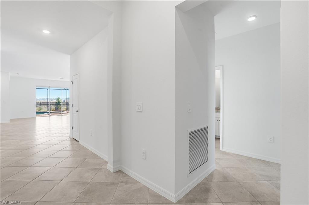 3958 Button Sage Road Alva, FL 33920 - Photo 4 of 50 a view of a hallway