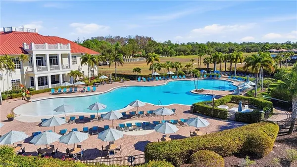 a picture of a room with lounge chairs