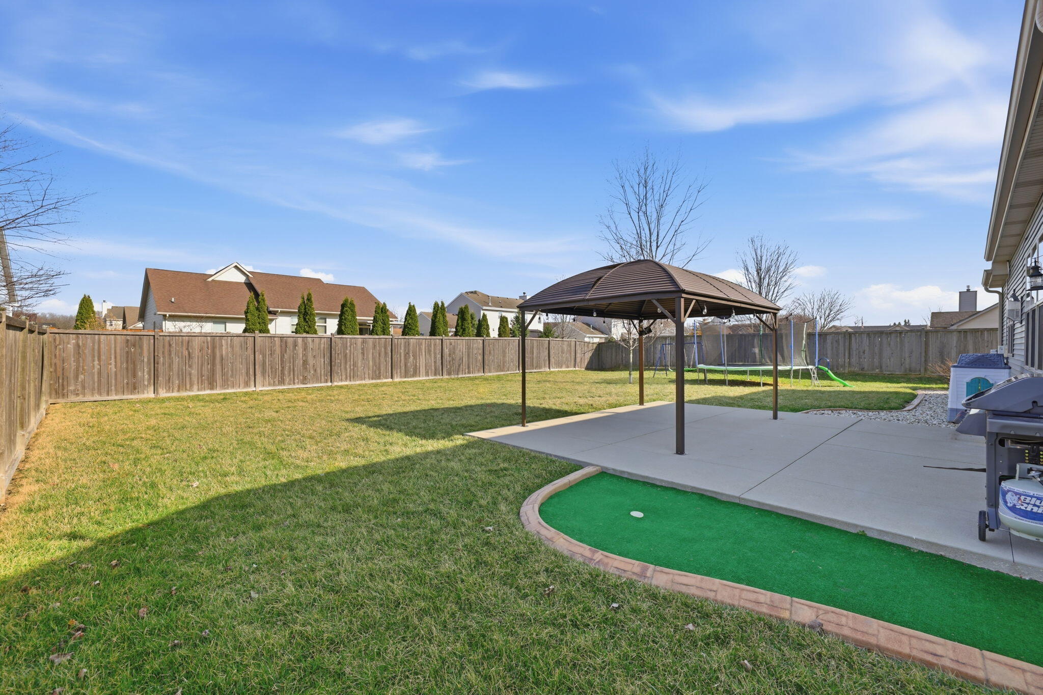 621 Fox Run Lane Mount Pleasant, WI 53406 - Photo 27 of 29 Putting green off patio