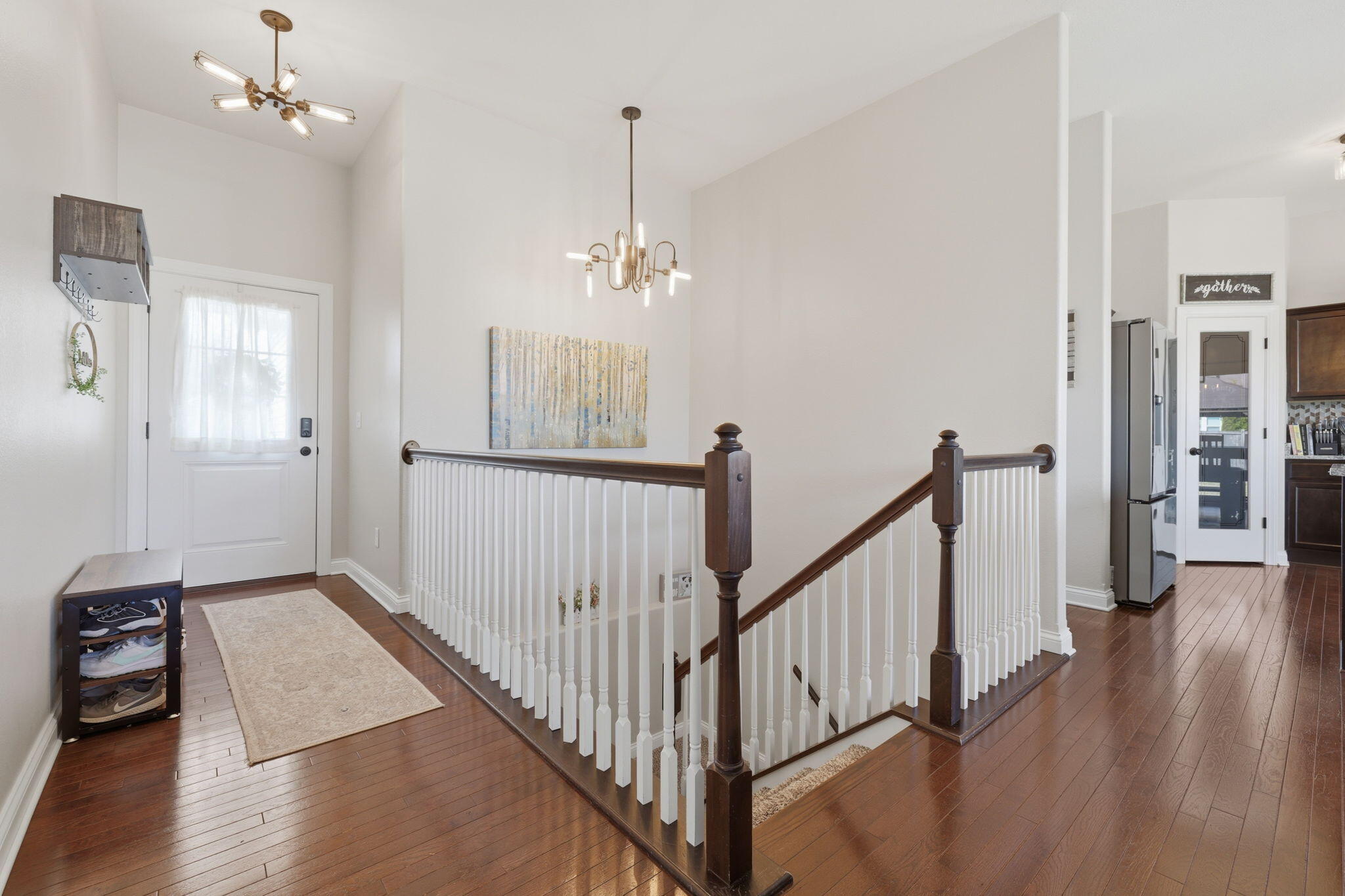 621 Fox Run Lane Mount Pleasant, WI 53406 - Photo 9 of 29 Open staircase to basement
