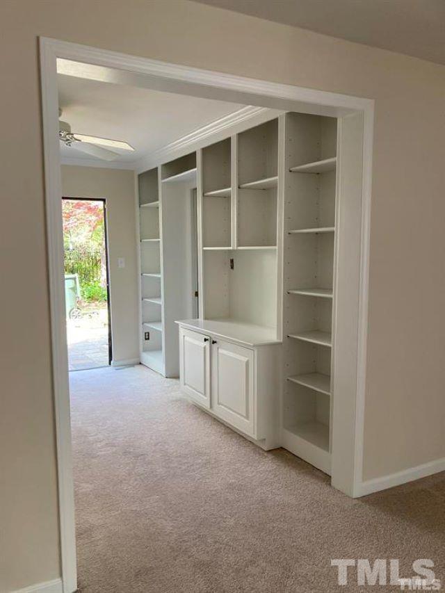 2892 Wycliff Road Raleigh, NC 27607 - Photo 12 of 20 a view of an empty room with a fireplace