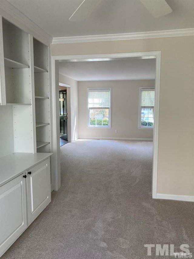 2892 Wycliff Road Raleigh, NC 27607 - Photo 13 of 20 a view of livingroom with hardwood floor and hallway