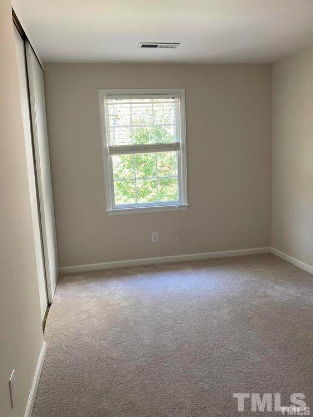 2892 Wycliff Road Raleigh, NC 27607 - Photo 16 of 20 an empty room with a window