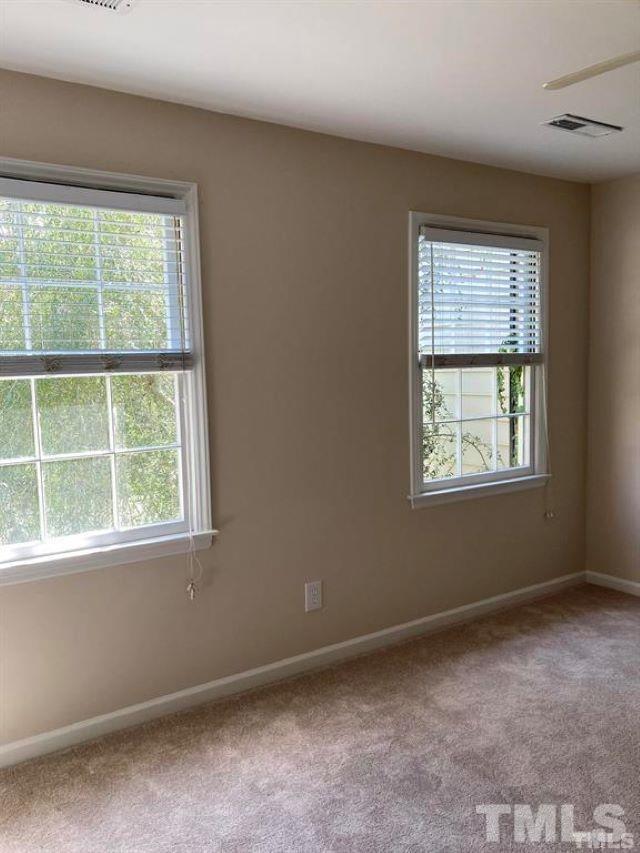 2892 Wycliff Road Raleigh, NC 27607 - Photo 18 of 20 an empty room with a window