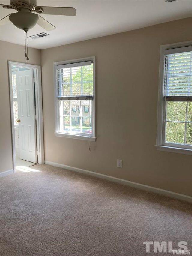 2892 Wycliff Road Raleigh, NC 27607 - Photo 19 of 20 a view of an empty room with a window