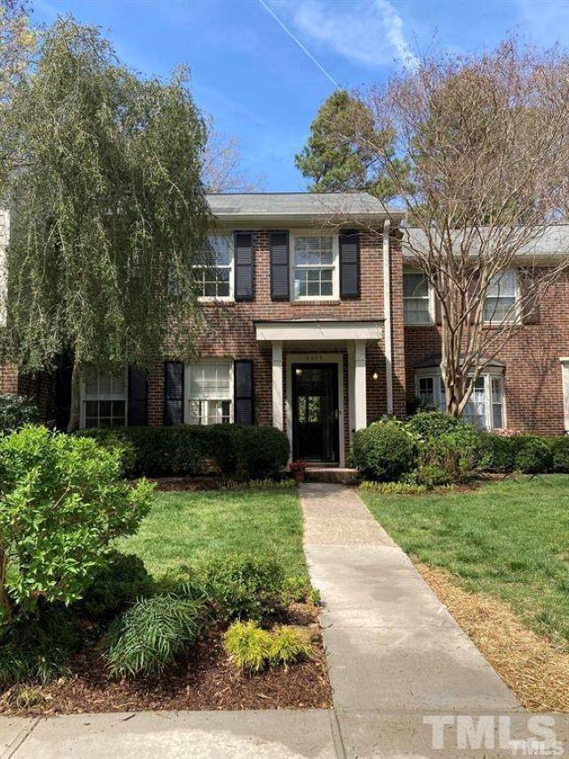 2892 Wycliff Road Raleigh, NC 27607 - Photo 2 of 20 a front view of a house with a yard