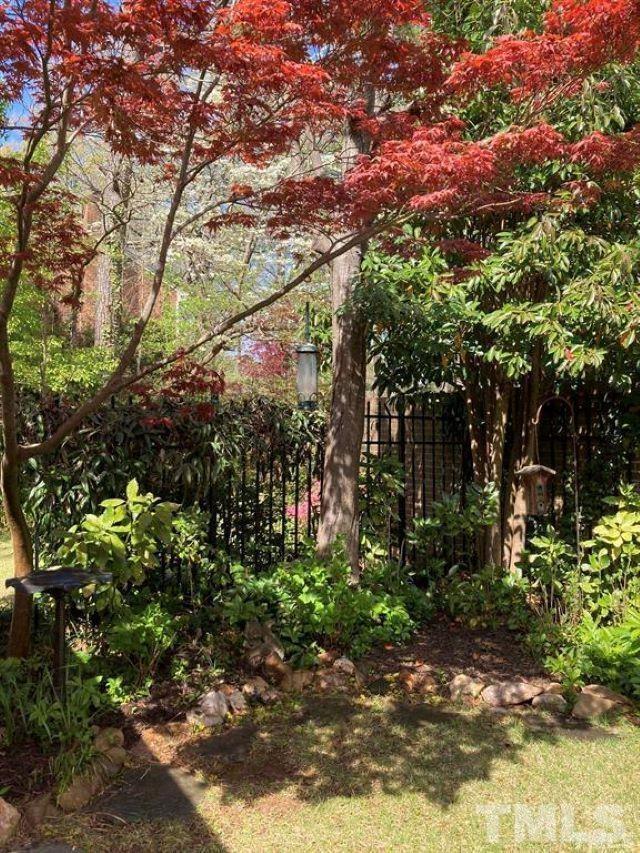 2892 Wycliff Road Raleigh, NC 27607 - Photo 8 of 20 a backyard of a house with lots of green space