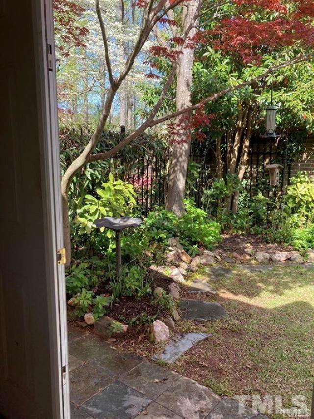2892 Wycliff Road Raleigh, NC 27607 - Photo 9 of 20 a backyard of a house with lots of green space