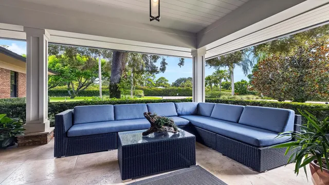 a spacious bedroom with a bed and a dresser