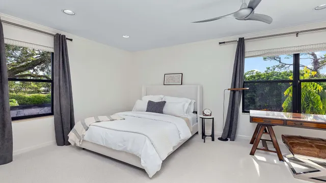 a front view of house with yard swimming pool and outdoor seating