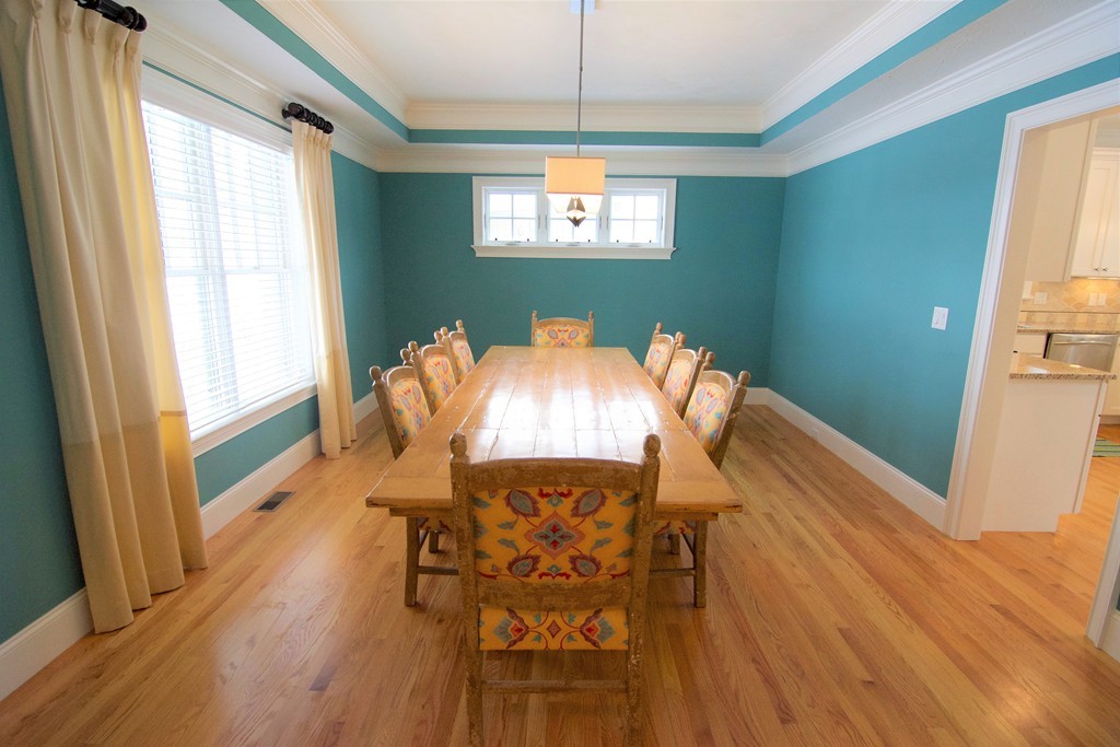 30 Nobscot Road, Unit 24 Sudbury, MA 01776 - Photo 12 of 24 a view of a dining room with furniture and wooden floor