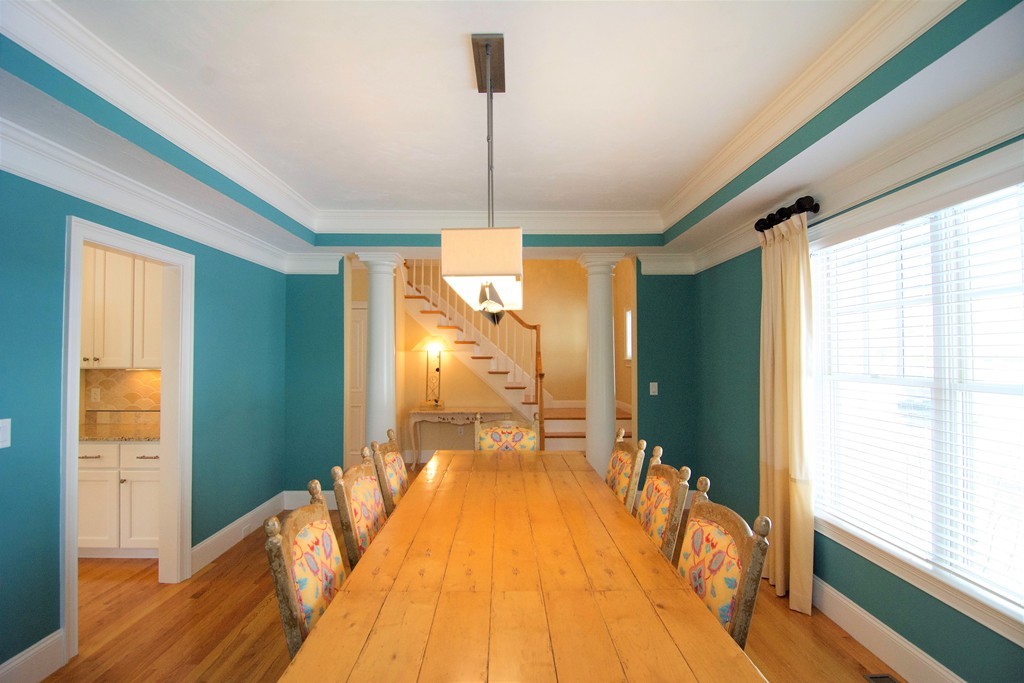 30 Nobscot Road, Unit 24 Sudbury, MA 01776 - Photo 13 of 24 a bedroom with a bed and a chandelier