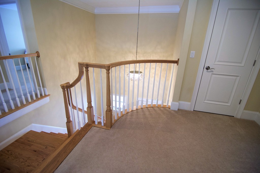 30 Nobscot Road, Unit 24 Sudbury, MA 01776 - Photo 17 of 24 a view of a hallway with staircase