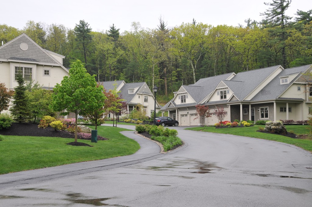 30 Nobscot Road, Unit 24 Sudbury, MA 01776 - Photo 2 of 24 a front view of a house with a garden