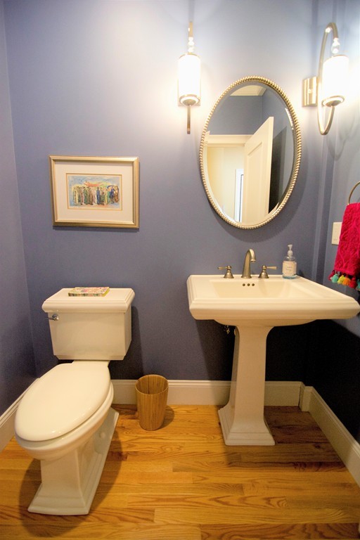 30 Nobscot Road, Unit 24 Sudbury, MA 01776 - Photo 22 of 24 a bathroom with a toilet sink and mirror