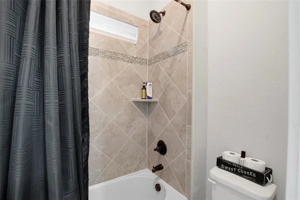 a bathroom with a bathtub
